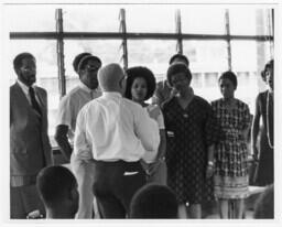 A Group of People Singing in a Choir, circa 1972