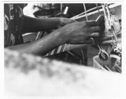 A Pair of Hands Weaving, circa 1972