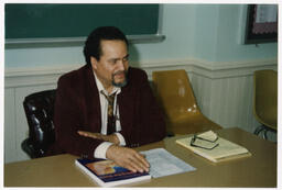 Asa Hilliard Sitting at a Desk, 1983