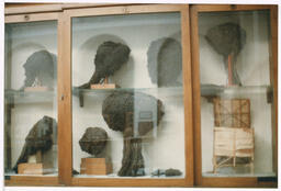 Figures in a Glass Case, circa 2002