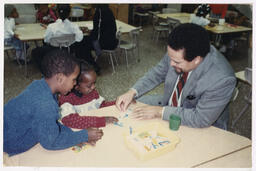 Dr. Hilliard with Children, circa 2000