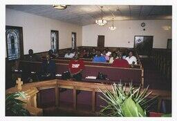 People Seated in Chapel, 2007