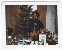 Girl Standing in Front of a Christmas Tree, circa 1975