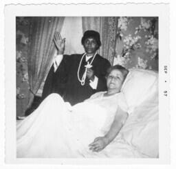 Elderly Woman in Bed with a Priest, circa 1957