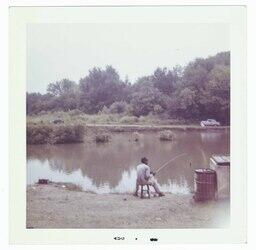 Man Fishing by a Lake, circa 1962