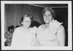 Two Women in Formal Dresses, circa 1958