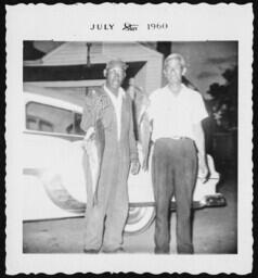 Men Holding Fish, circa 1960