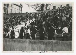 A Football Crowd and The Marching Band in Bleachers, circa 1965