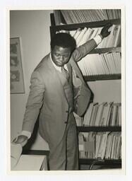 A Man at a Bookshelf, circa 1975