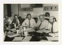 A Group of Men at a Table, circa 1980