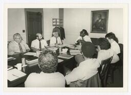 A Group of Men at a Table, circa 1980