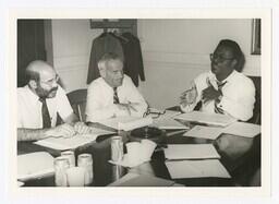 A Group of Men at a Table, circa 1980