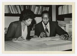 A Man and a Woman at a Table, circa 1980