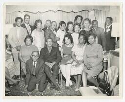 A Group Portrait of Faculty Members at a Gathering, circa 1960