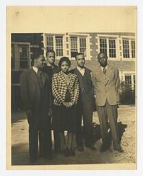 A Group Portrait of Four Men and a Woman Outside, circa 1960