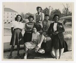 A Group Portrait of Six Young Women and a Car, circa 1955