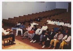 A Group of Young Men and Women in an Auditorium at an Admissions Orientation Event, circa 1985