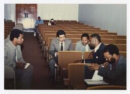 A Group of Unidentified Men in an Auditorium at an Admissions Orientation Event, circa 1985