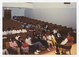 A Group of Young Men and Women in an Auditorium at an Admissions Orientation Event, circa 1985