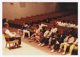 A Group of Young Men and Women in an Auditorium at an Admissions Orientation Event, circa 1985