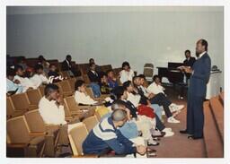 A Group of Young Men and Women in an Auditorium at an Admissions Orientation Event, circa 1985