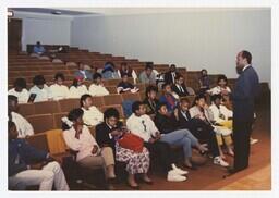 A Group of Young Men and Women in an Auditorium at an Admissions Orientation Event, circa 1985