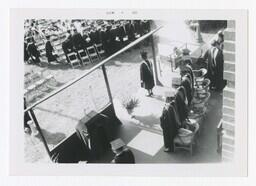 Aerial View of Unidentified Woman on Stage at Commencement, June 1968