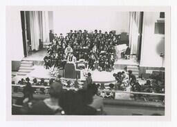 A Choir, Men and Women on Stage at Commencement, circa 1975