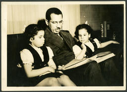 Brailsford R. Brazeal Reading to His Daughters, circa 1947