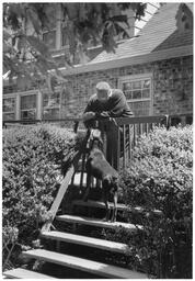 C. Eric Lincoln With His Dog, 1984