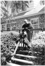 C. Eric Lincoln With His Dog, 1984