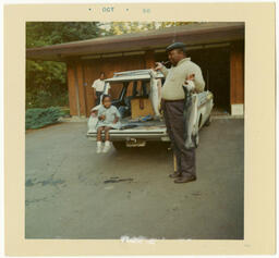 C. Eric Lincoln Holding Fish, 1966