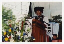 Alumna Reatha Clark King on Stage at Commencement, circa 2002