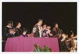 A Group of Men and Women at Convocation, circa 1994