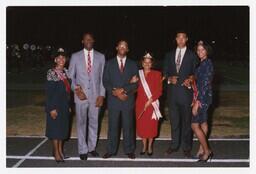 A Portrait of Miss CAU, Three Men, and Two Other Women at Homecoming, 1990