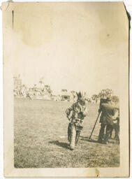 Photographer and Man Dressed as Native American Caricature, circa 1911