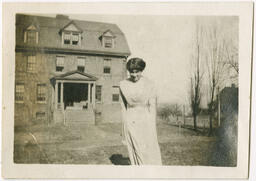 Woman in Front of a Building, circa 1911