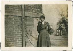 Woman Next to Building, circa 1911