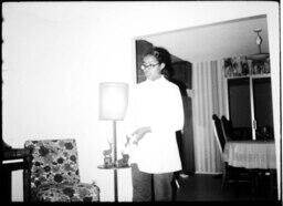 Girl Standing in Living room, circa 1972