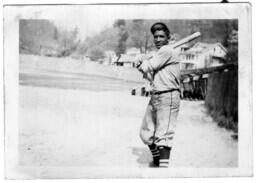 Baseball Player Holding a Bat, circa 1942