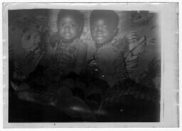 An Boy and Girl Sitting on a Couch, circa 1943