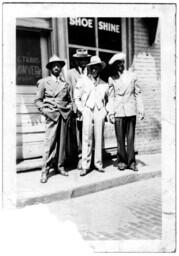 Group of Men on a Sidewalk, circa 1942