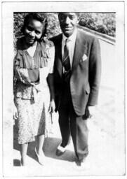 Couple Standing on the Sidewalk, circa 1942