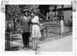 Couple Stand in Front of a House, circa 1942