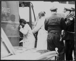 Woman and Man Detained, circa 1960