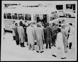 Clergymen Leaving Bus Ride, circa 1960