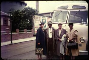 Levi and Jewell Terrill in Front of a Bus, circa 1955