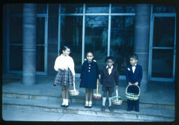 Children Holding Baskets, August 1961