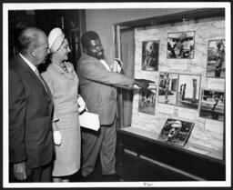 Dr. and Mrs. Hugo Skala and Mr. Vincent Kofi, Sculptor, May 1, 1960