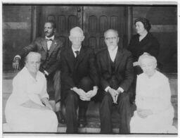 Educators Sit on Steps, circa 1905